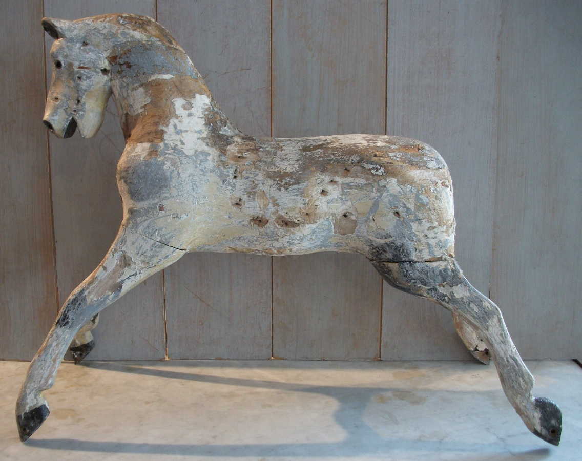 wooden rocking horse sculpture